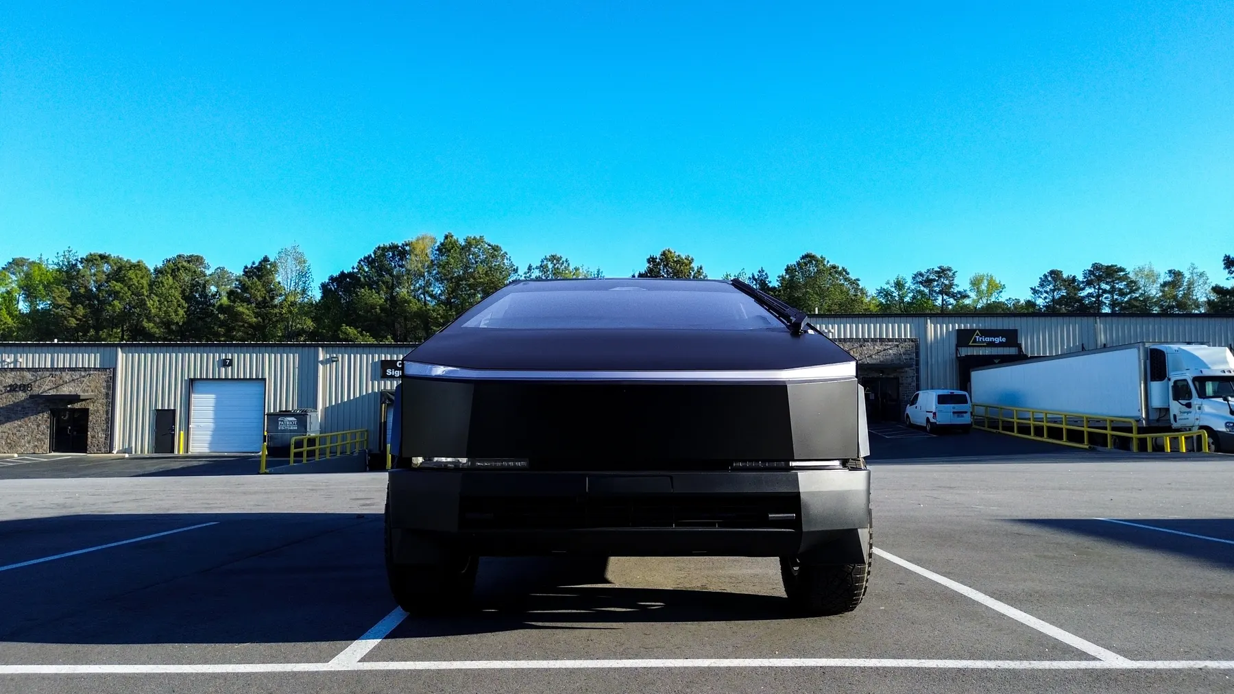 Satin-black Cybertruck head-on